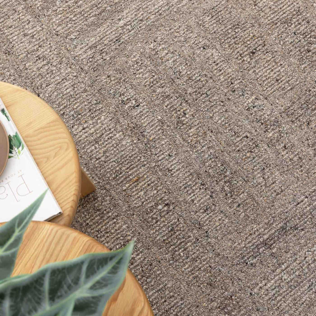 Nebraska Timber wool rug with boucle texture in warm brown-grey tones, available at Rugs N Timber Belrose showroom.
