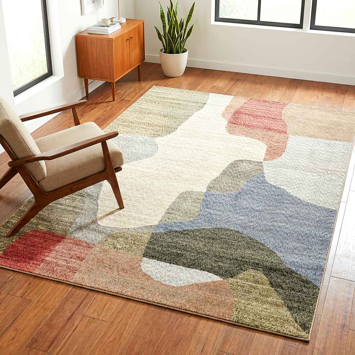 Ophelia Atelier contemporary abstract rug with flowing organic shapes and warm earthy colours.