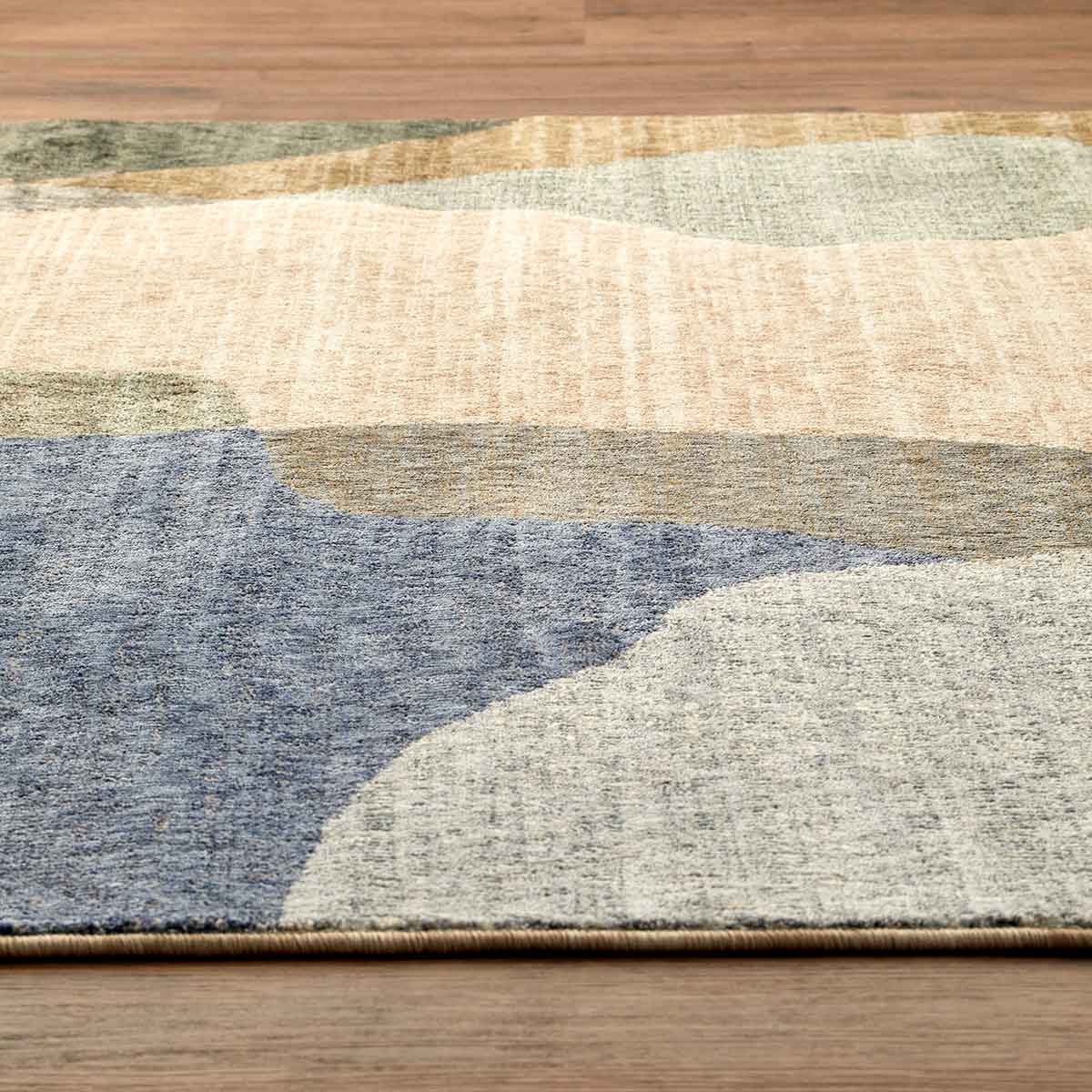 Ophelia Atelier contemporary abstract rug with flowing organic shapes and warm earthy colours.