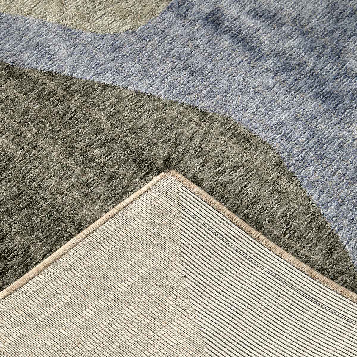 Ophelia Atelier contemporary abstract rug with flowing organic shapes and warm earthy colours.