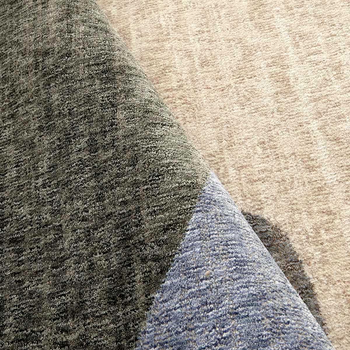 Ophelia Atelier contemporary abstract rug with flowing organic shapes and warm earthy colours.
