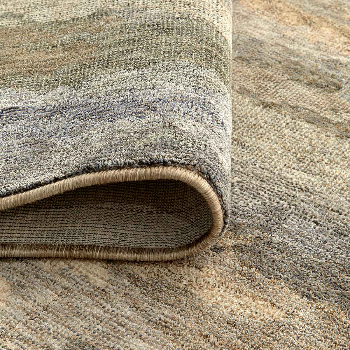 Ophelia Canvas contemporary abstract rug with painterly textures in warm neutral tones.