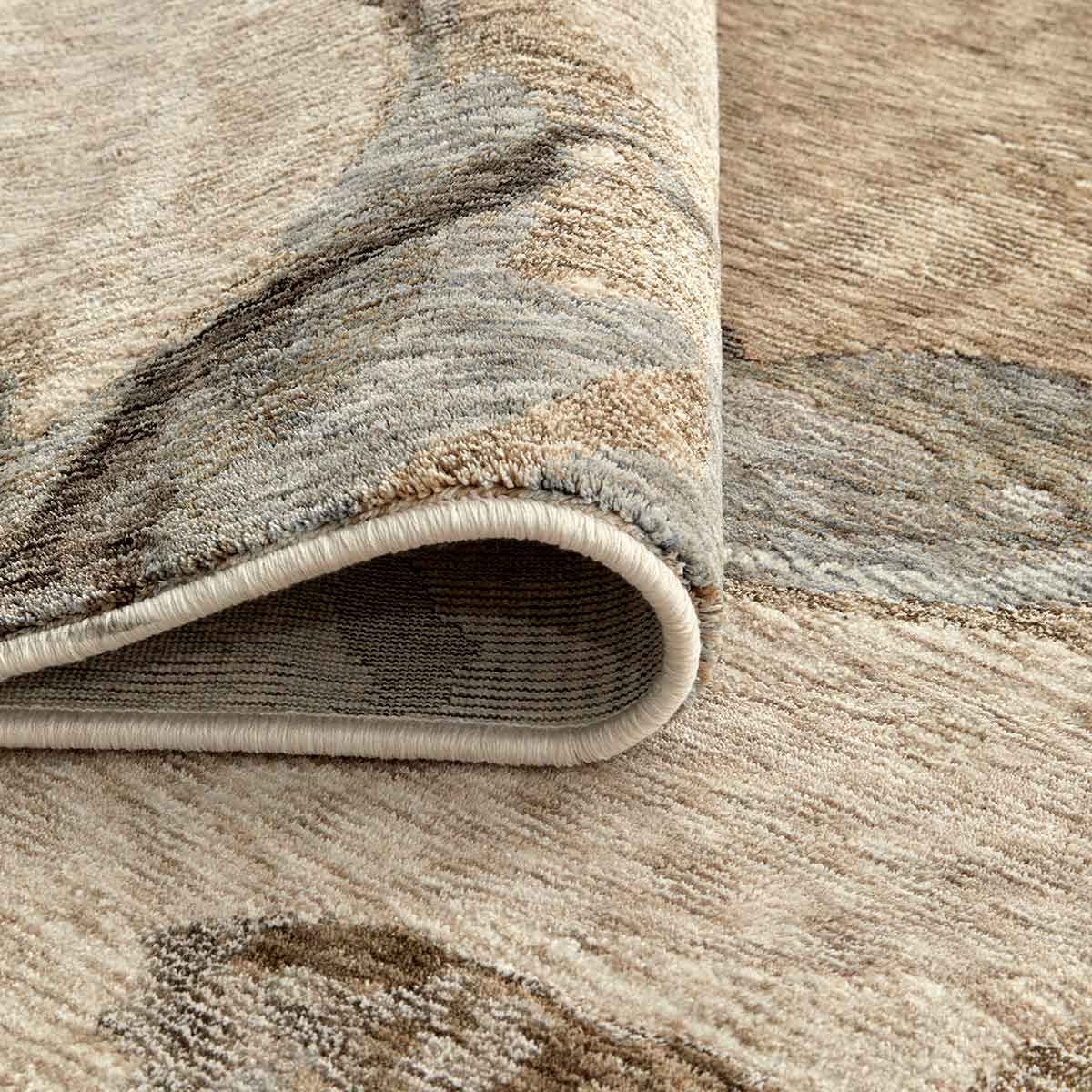 Ophelia Form contemporary marble effect rug inspired by flowing natural stone.
