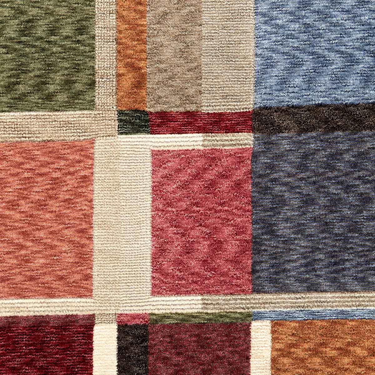 Ophelia Grid contemporary geometric rug featuring layered earthy tones and architectural lines.