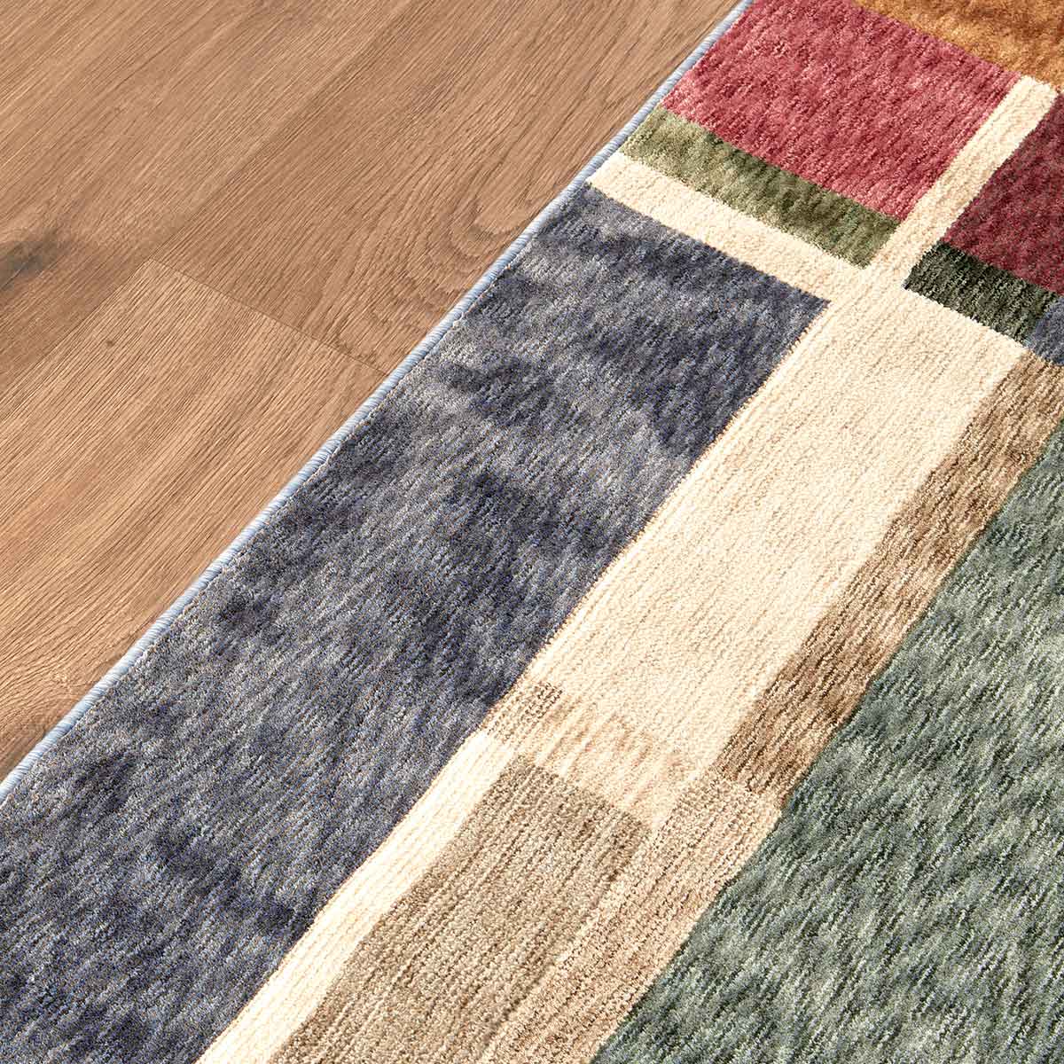 Ophelia Grid contemporary geometric rug featuring layered earthy tones and architectural lines.