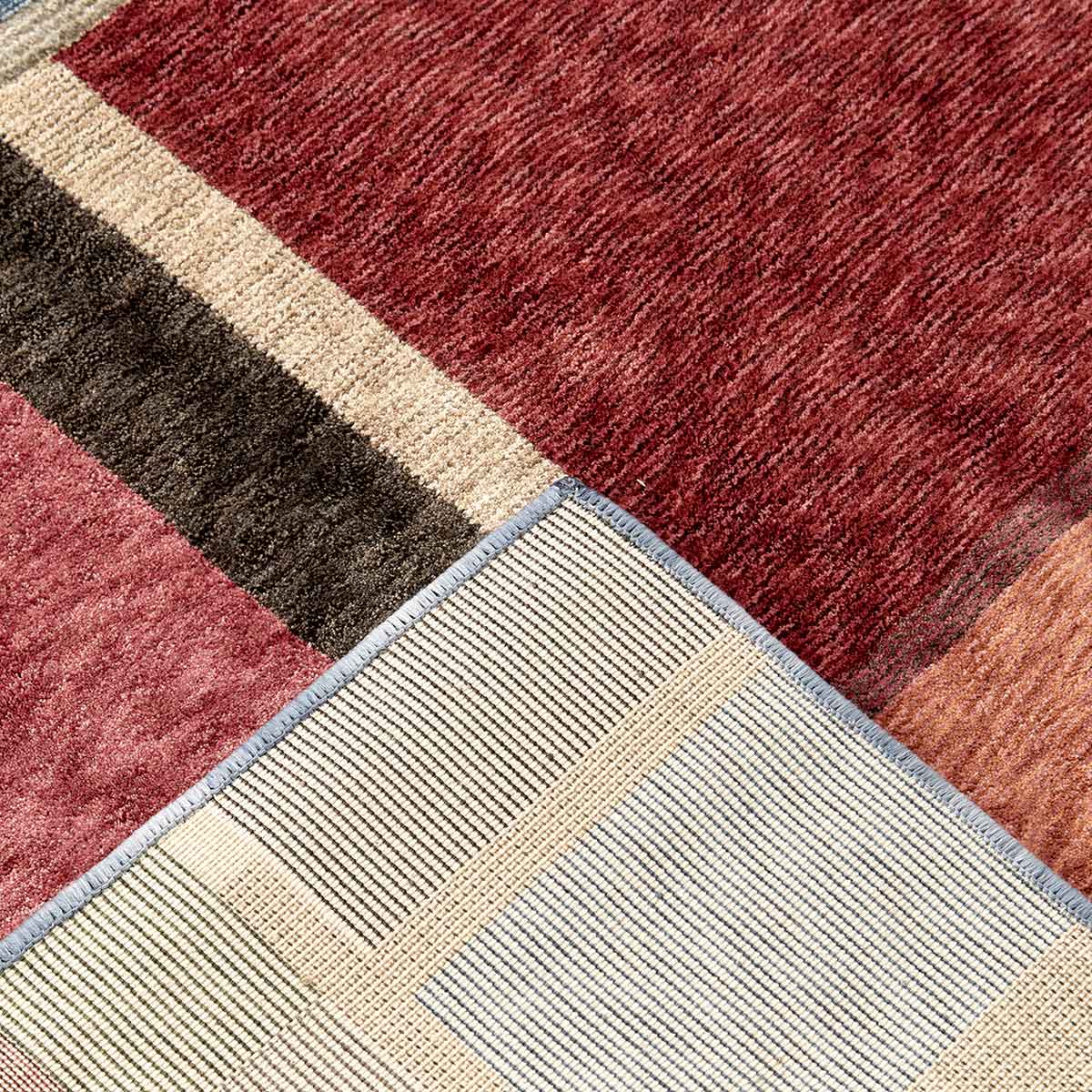 Ophelia Grid contemporary geometric rug featuring layered earthy tones and architectural lines.