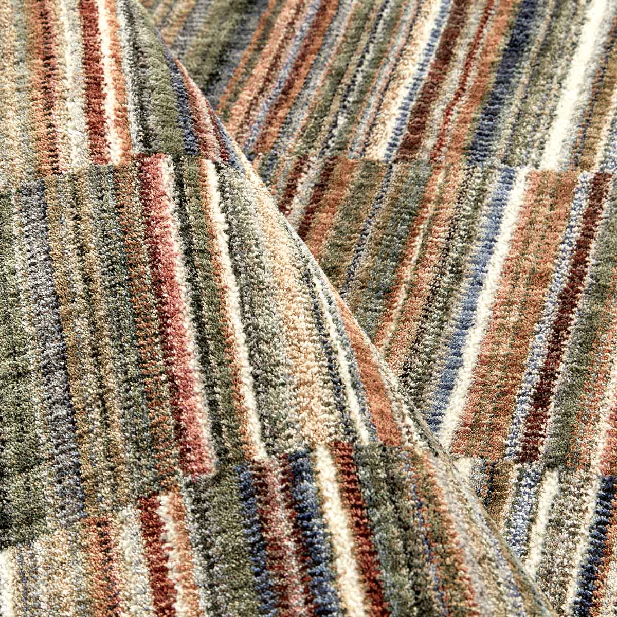 Ophelia Mosaic contemporary patterned rug with layered geometric mosaic design.