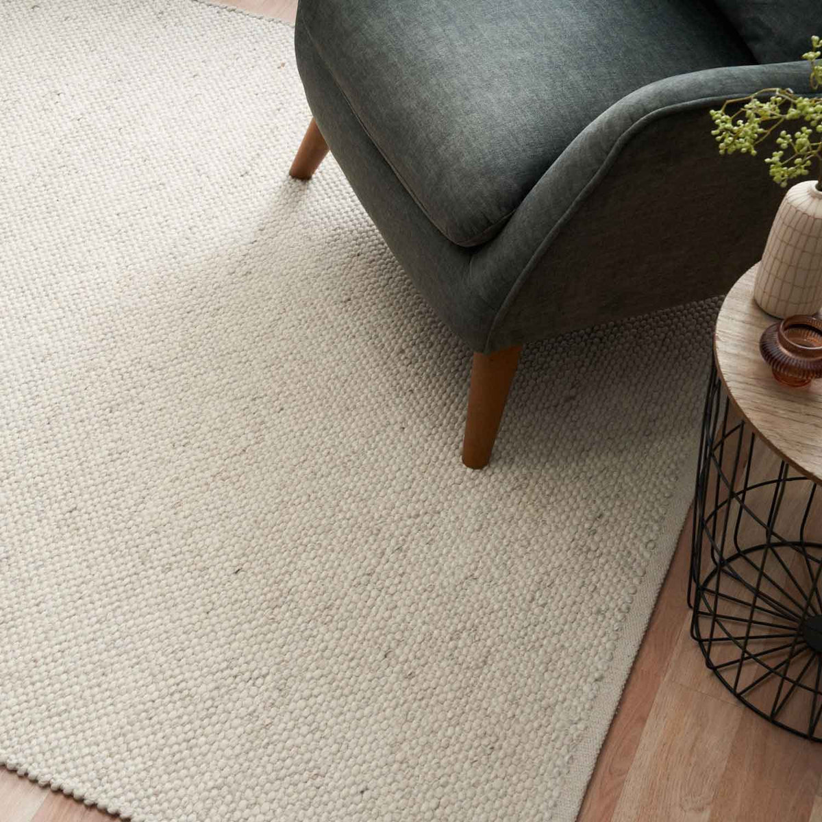 Morris Pearl textured wool rug with handwoven finish in a soft neutral tone, available at Rugs N Timber Belrose showroom