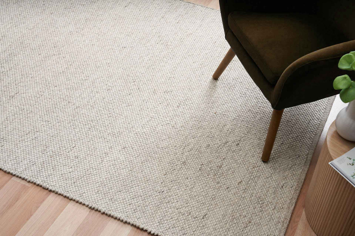 Morris Stone textured wool rug featuring a natural handwoven finish, view in person at Rugs N Timber Belrose showroom