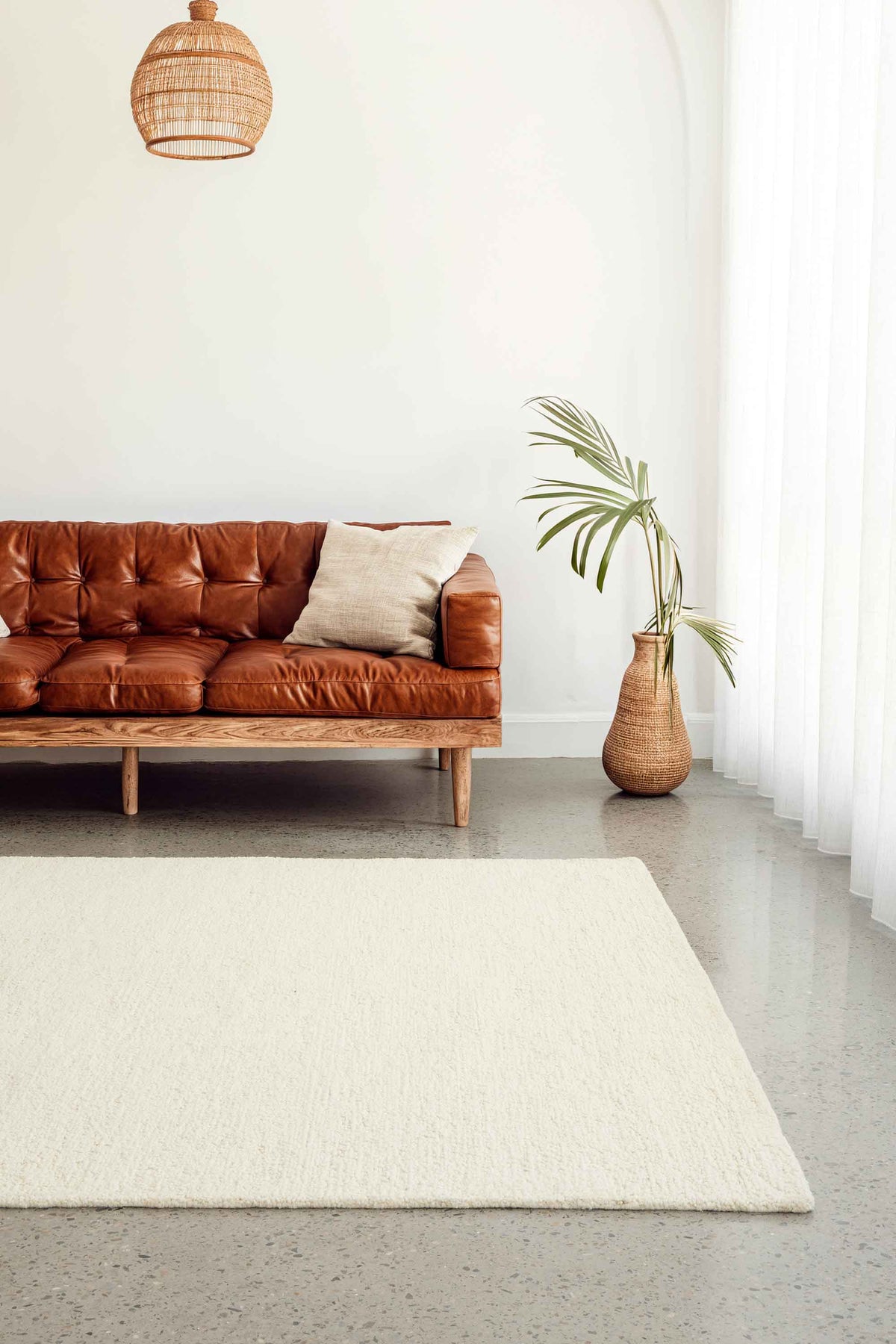 Rueben Sweet Milk premium hand tufted cream wool rug from the St Kitts Collection at Rugs N Timber Belrose showroom.