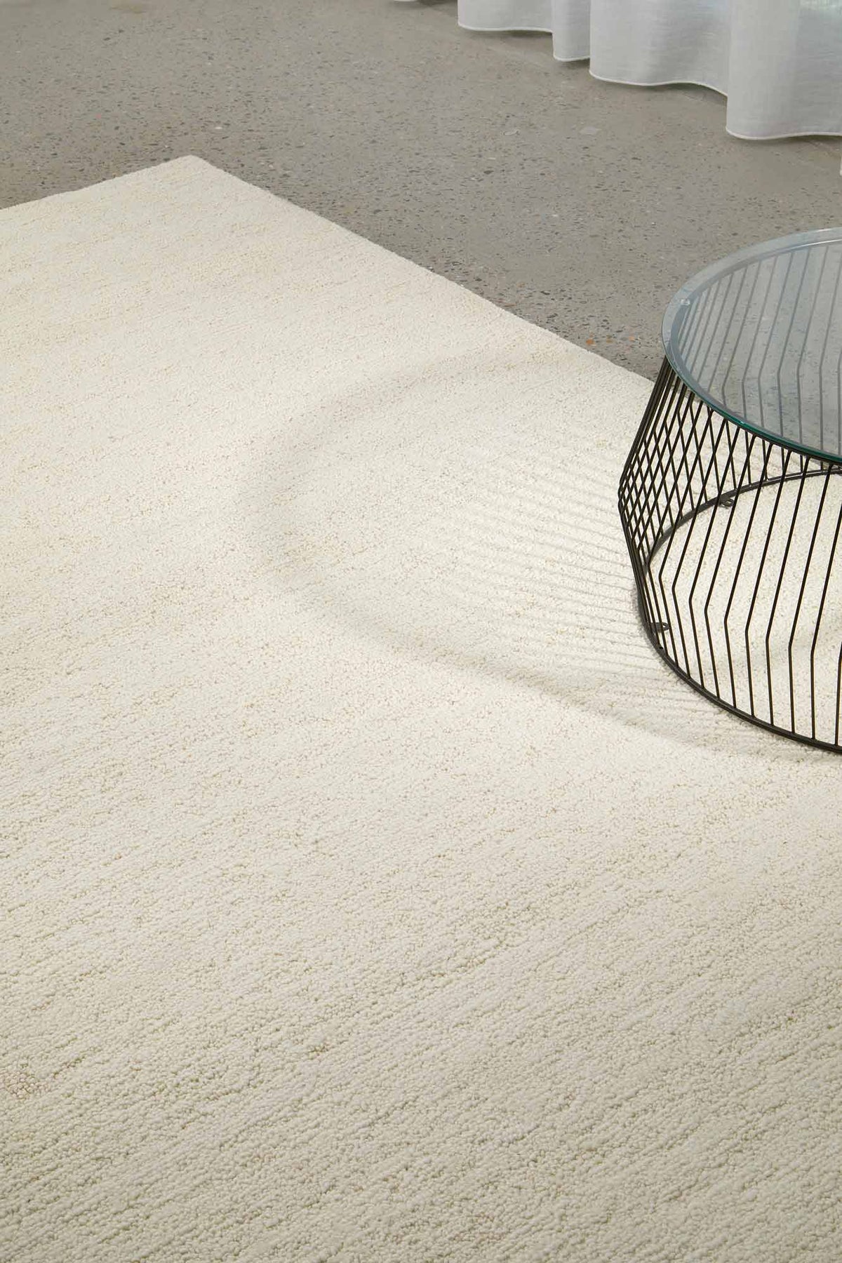 Rueben Sweet Milk premium hand tufted cream wool rug from the St Kitts Collection at Rugs N Timber Belrose showroom.