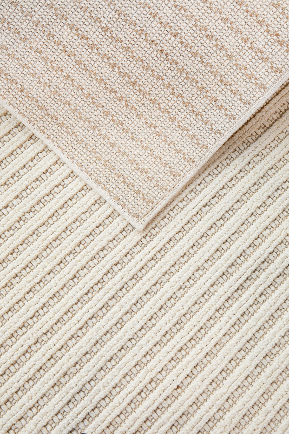 Serafina Cloud indoor and outdoor rug with textured linear design available at Rugs N Timber Belrose showroom