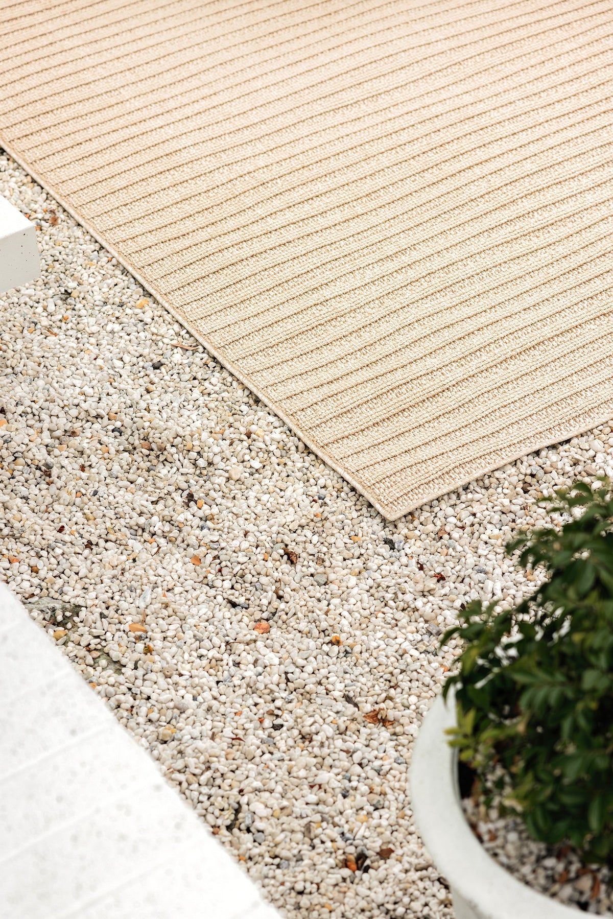 Serafina Latte indoor and outdoor rug with textured linear pattern at Rugs N Timber Belrose showroom