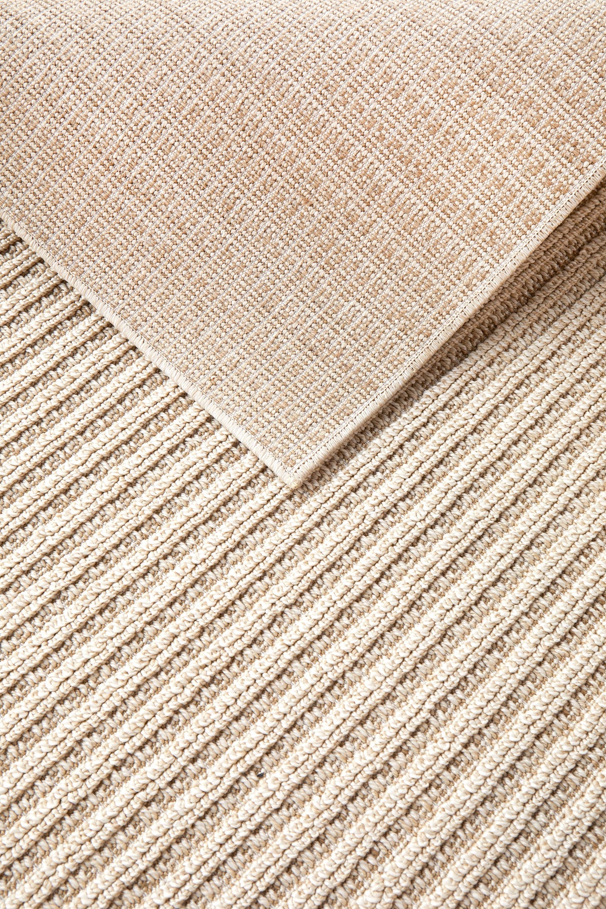 Serafina Latte indoor and outdoor rug with textured linear pattern at Rugs N Timber Belrose showroom