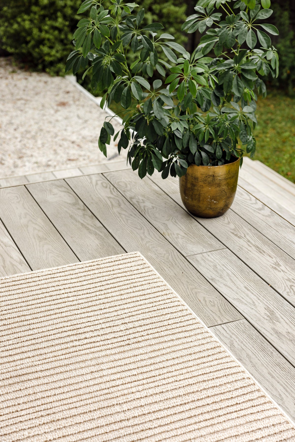 Serafina Latte indoor and outdoor rug with textured linear pattern at Rugs N Timber Belrose showroom