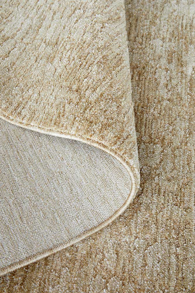 Close-up of Steph & Gian Willow Wheat rug showing subtle irregular texture, on display in Belrose